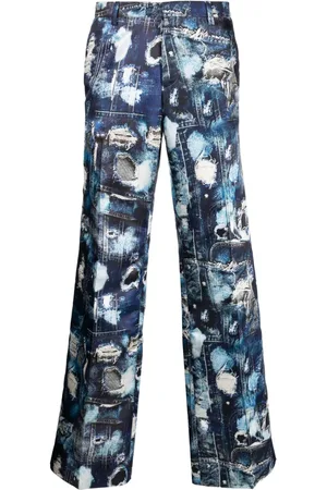 John Richmond Ripped denim-print tailored trousers