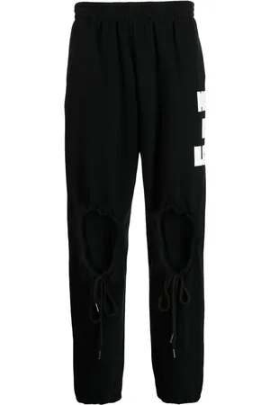 Natasha Zinko Heart-shaped cut-out detail track pants