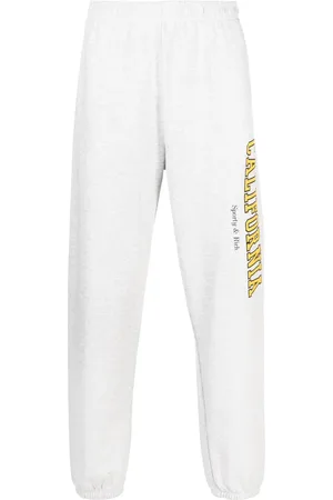 Sporty & Rich Text-print cotton-blend pants