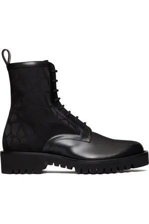 VALENTINO GARAVANI Toile Iconographe leather combat boots