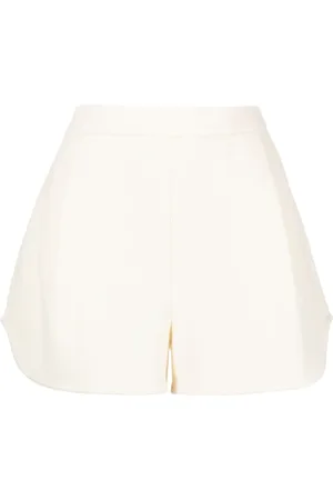 GOODIOUS Pleat-detail cloqué shorts