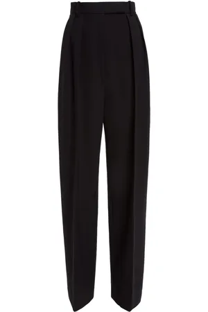 Khaite Cessie pleated high-waisted trousers