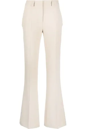 Tela Bergamotto ring-embellished Flared Trousers - Farfetch