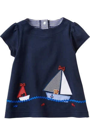 Familiar Motif-embroidered cotton blouse