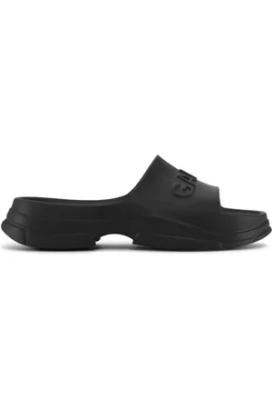 Ganni Logo-embossed chunky slides