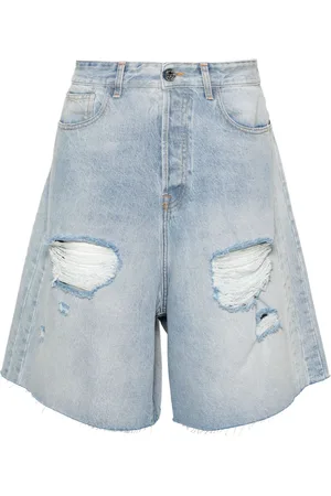 Vetements Destroyed mid-rise ripped wide-leg denim shorts