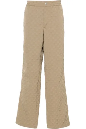 MISBHV Debossed-logo straight-leg trousers