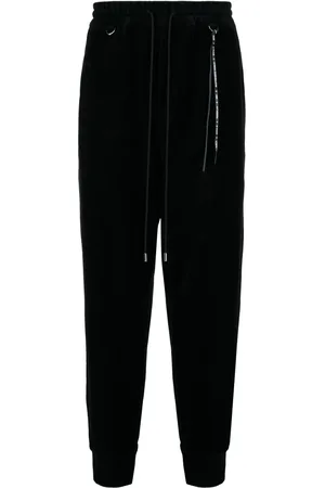 MASTERMIND Logo-jacquard tapered track pants