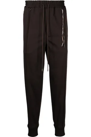 MASTERMIND Logo-jacquard tapered track pants