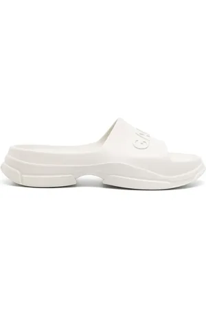 Ganni Logo-embossed tonal-design slides