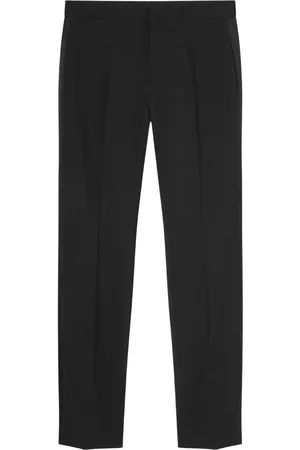 VERSACE Logo-appliqué tapered chino trousers