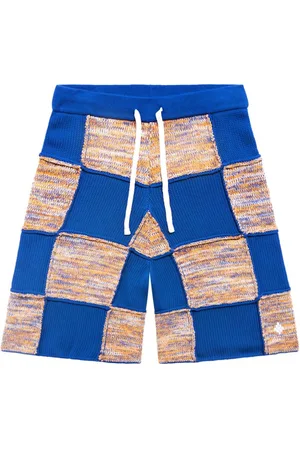 MARCELO BURLON Patchwork knitted track shorts