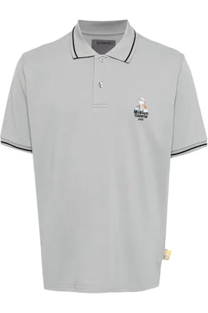 Musium Div. Logo-appliqué cotton polo shirt