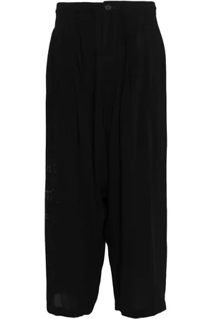 YOHJI YAMAMOTO Graphic-print cropped velvet trousers
