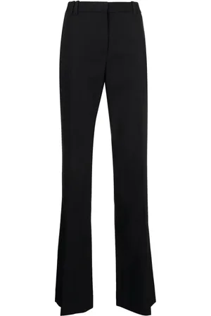 The Row Mid-rise bootcut trousers