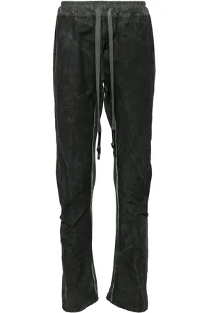 ISAAC SELLAM EXPERIENCE Distressed slim-fit trousers