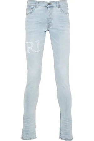 AMIRI Bandana-jacquard logo-appliqué jeans