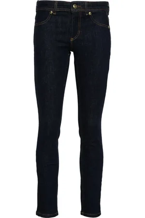 VERSACE Logo-plaque skinny jeans
