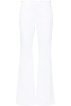 Givenchy Raw-cut detail low-rise flared jeans
