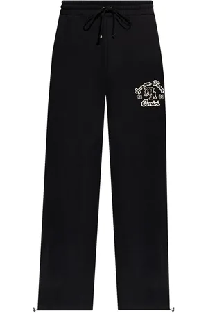 AMIRI Logo-appliqu?? cotton track pants
