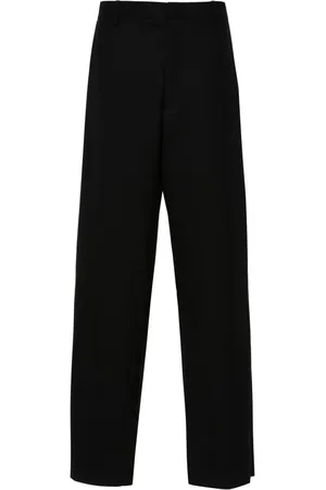 Moschino Pressed-crease trousers