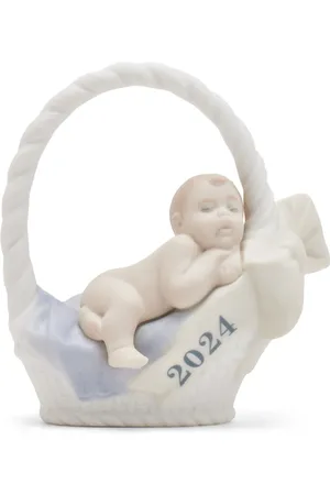 LLADRÒ Baby in a basket porcelain sculpture