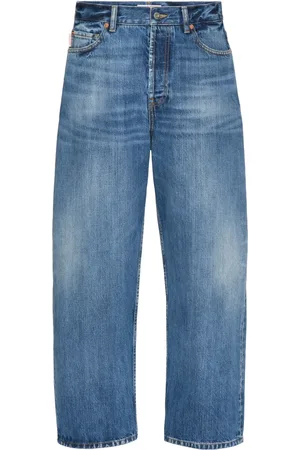 VALENTINO GARAVANI Logo-patch loose-fit jeans