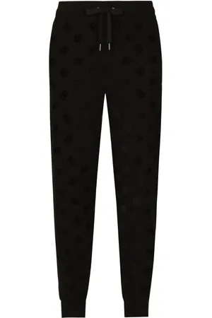 Dolce & Gabbana Monogram-embossed cotton track pants