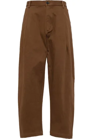 CROQUIS Pleat-detailing tapered trousers