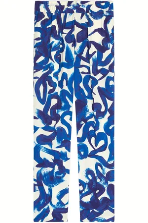 DRIES VAN NOTEN Abstract print slim-fit trousers