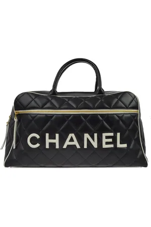 CHANEL 1995 logo patch travel bag