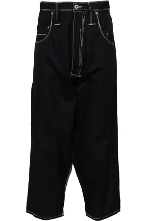 JUNYA WATANABE Pinstripe wool trousers