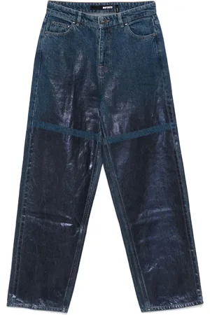 ROTATE Wide-leg coated jeans