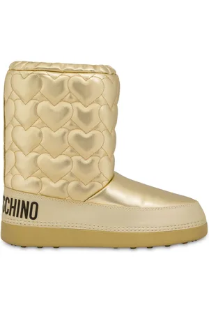 Moschino women s snow moon boots at THE OUTNET prices in Dubai FASHIOLA UAE