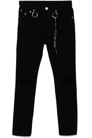 MASTERMIND Logo-print distressed denim