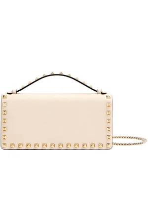 VALENTINO GARAVANI Rockstud-detailed clutch bag