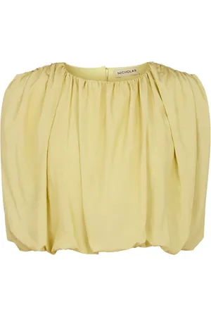 Nicholas Nadira top