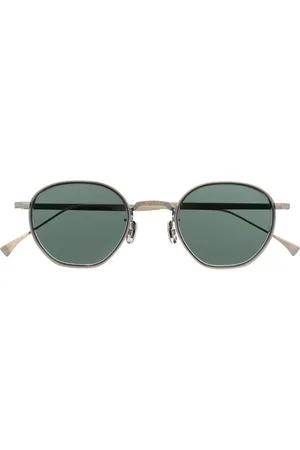 Eyevan 7285 Round-frame titanium sunglasses