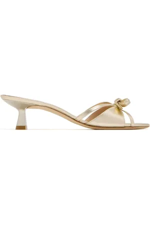 Stuart Weitzman 50mm bow detailing mules