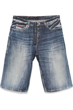 MARTINE ROSE Logo-patch denim shorts