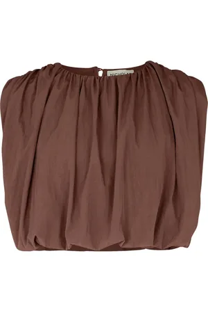 Nicholas Nadira top