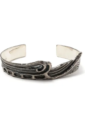 JULIUS Carved vintage-effect bracelets