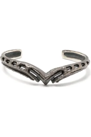 JULIUS Carved vintage-effect bracelets