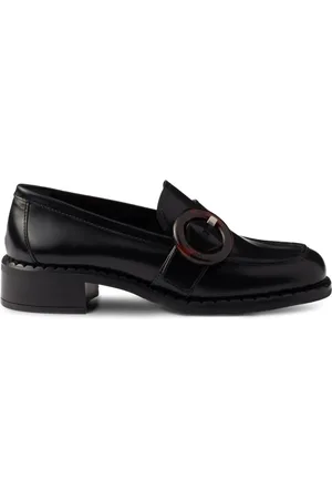 Prada Circular-buckle leather loafers
