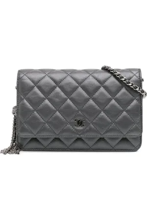 CHANEL 2018-2019 Quilted Aged Calfskin Tassel Wallet On Chain crossbody bag