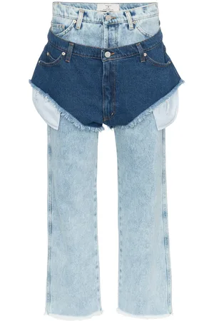 Natasha Zinko High waisted jeans with a denim shorts layer