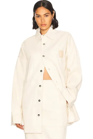 Helsa Denim Overshirt in - Ivory. Size M/L (also in ).