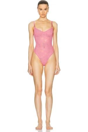 FLEUR DU MAL Le Stretch Multifit Lace Bodysuit in - Pink. Size L (also in XS).