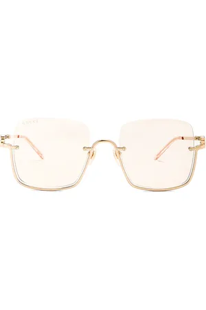 Gucci GG Upside Down Rectangular Sunglasses in - Metallic Gold. Size all.