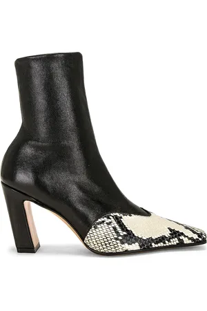Khaite Nevada Ankle Stretch Boot in - Black. Size 36 (also in 37, 37.5).
